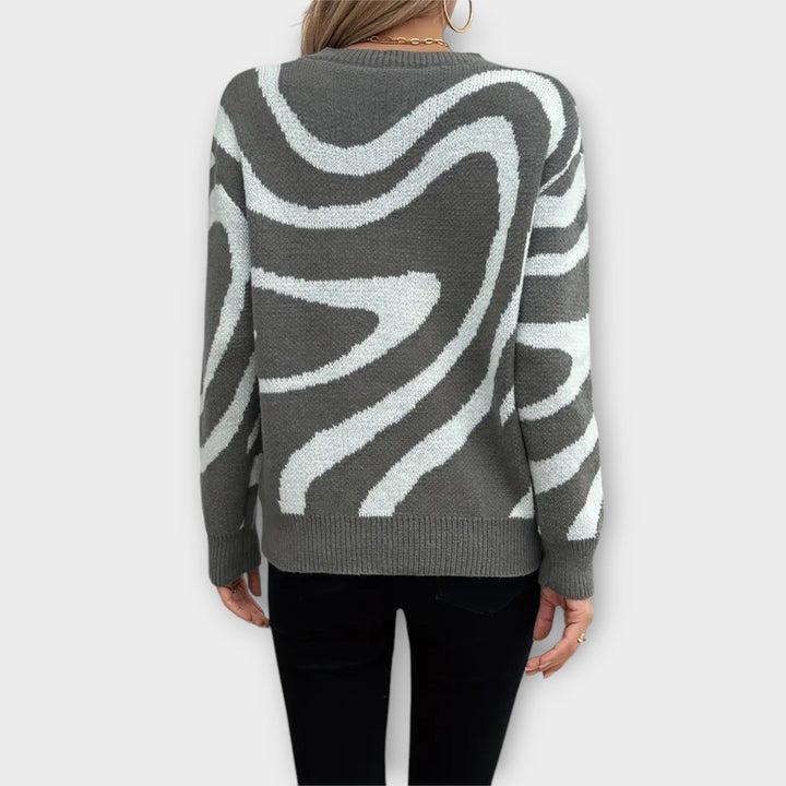 Anaïs - Pull en peluche gris-blanc avec motif zèbre