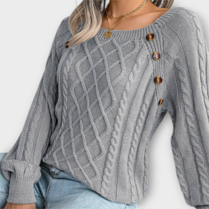 Margot - Pull gris foncé avec boutons et motif en torsades