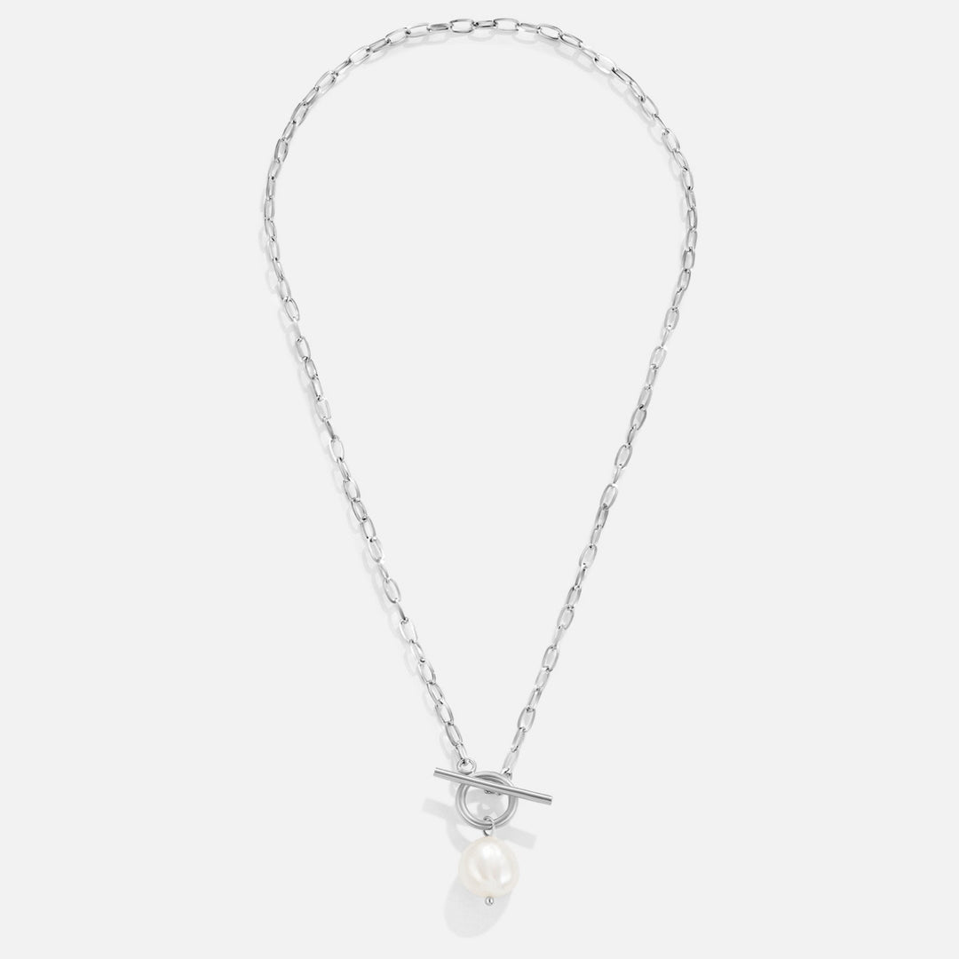 Éveline – Collier doré avec pendentif en perle