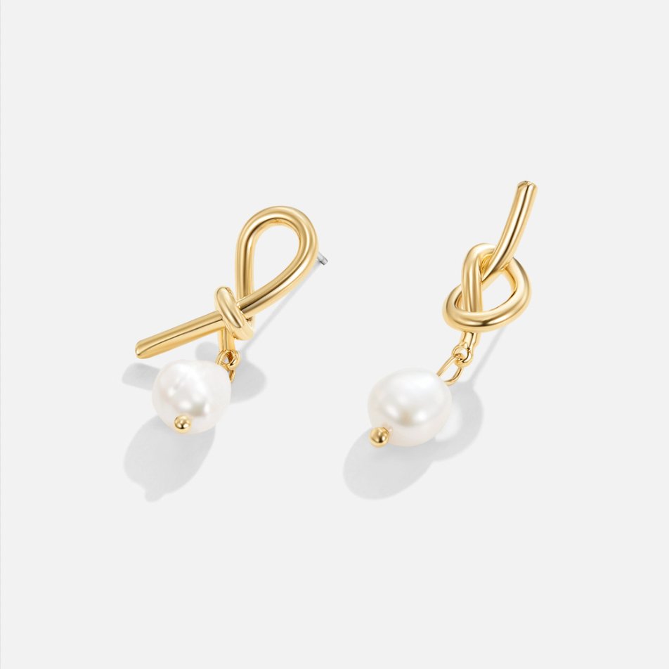 Thérèse-Sophie – Boucles d’oreilles en argent à la forme courbe
